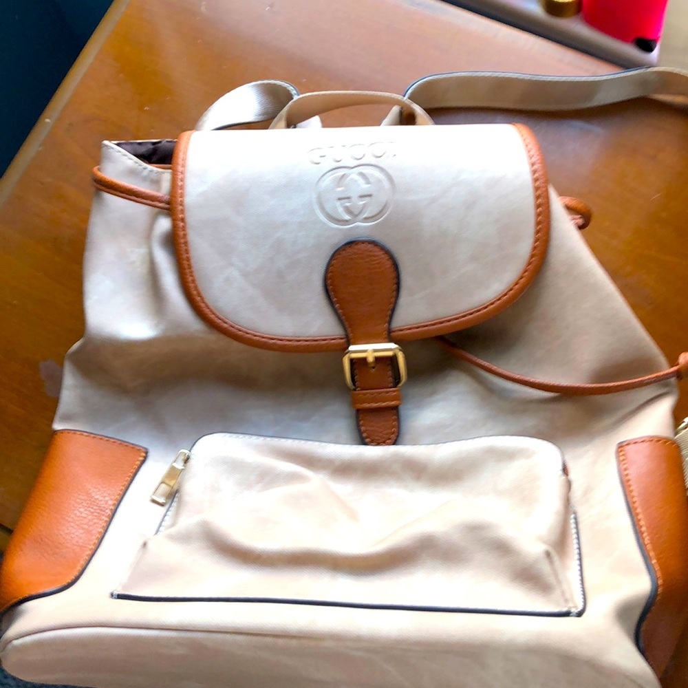 Beige Gucci backpack